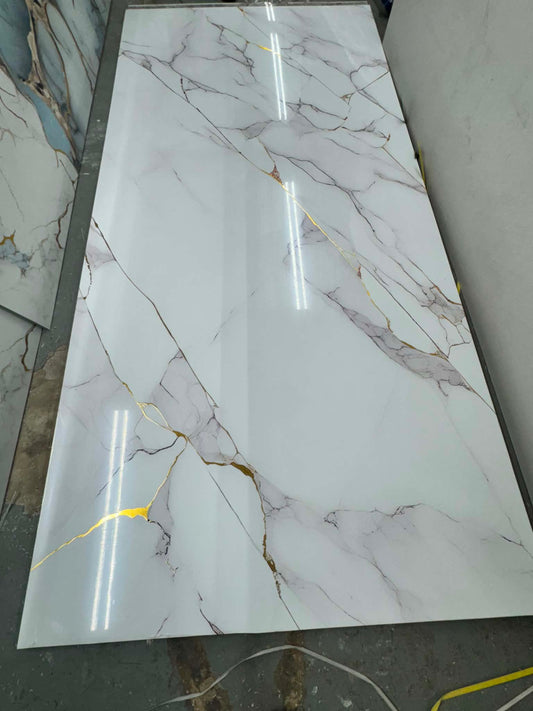 Calacatta gold marble effect PVC wall panel with white base, grey veining and gold accents
